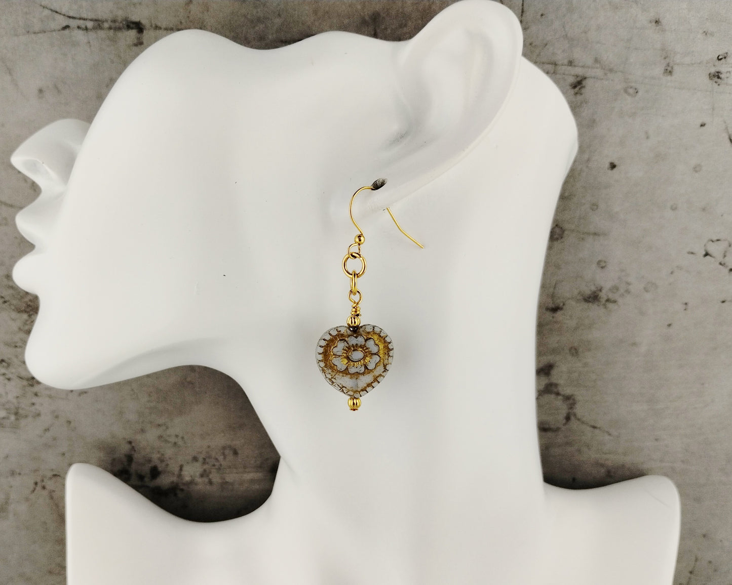 Elegant white heart dangle earrings with gold-plated accents