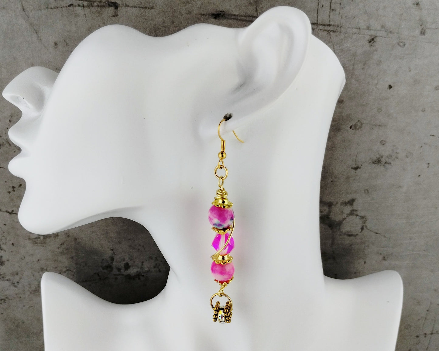 Shoulder duster earrings with rhinestone dangles and gold spacer beads
