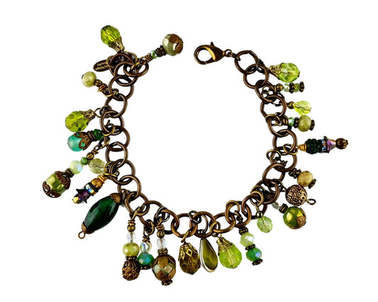 Handmade green beaded charm bracelet with olive and emerald tones
