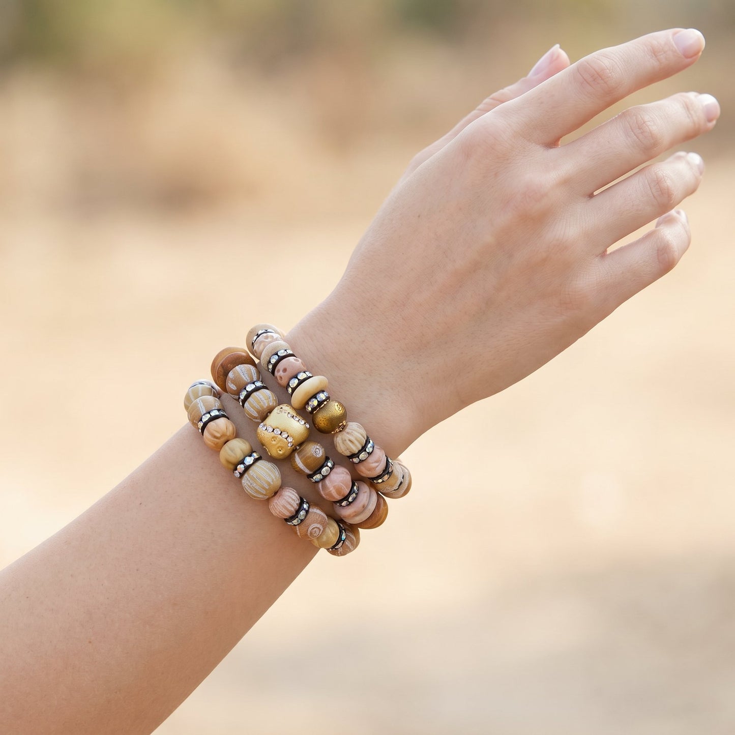 3 stretch bracelets on a hand model. 
