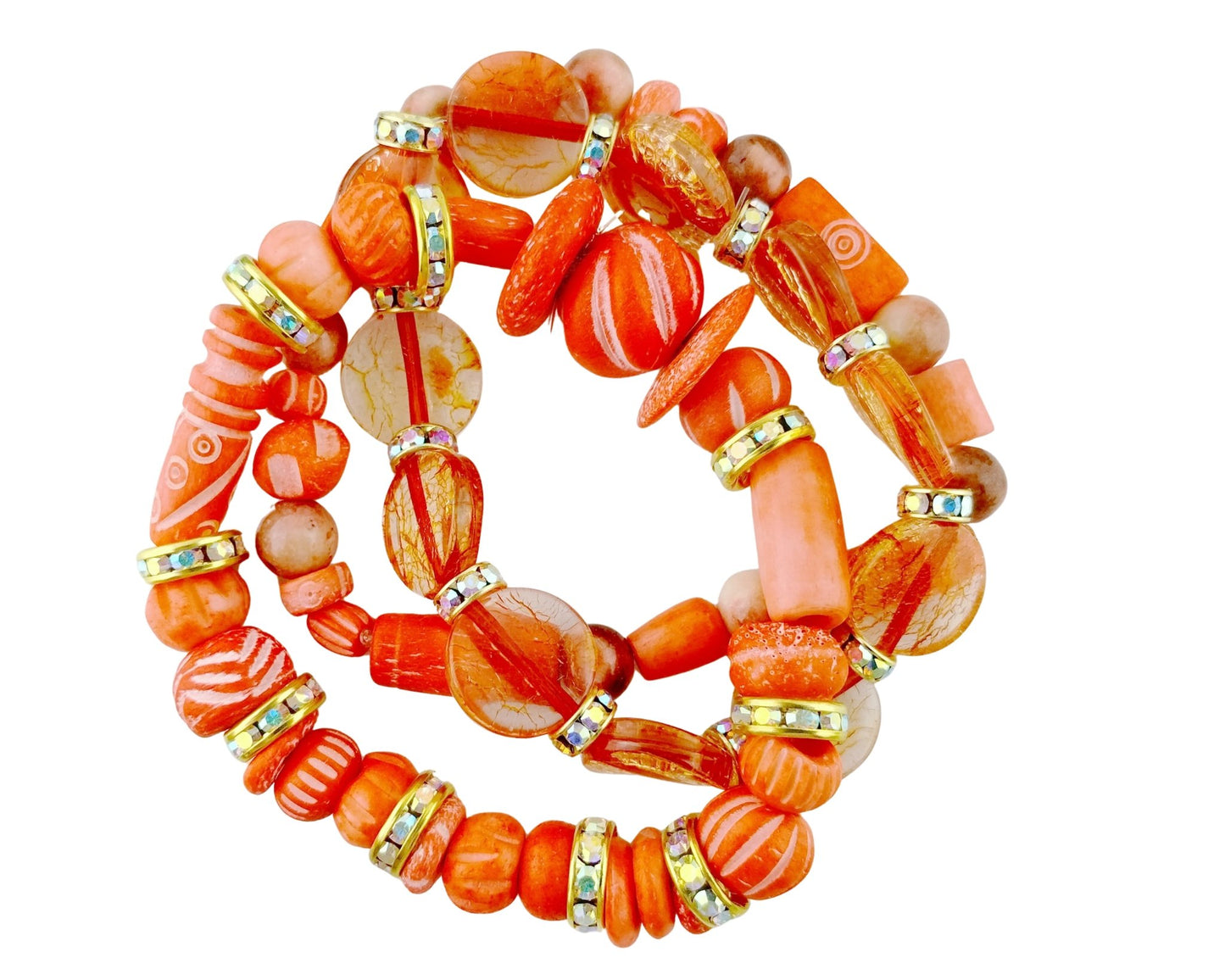 Stack of orange and pink beaded bracelets on a white background