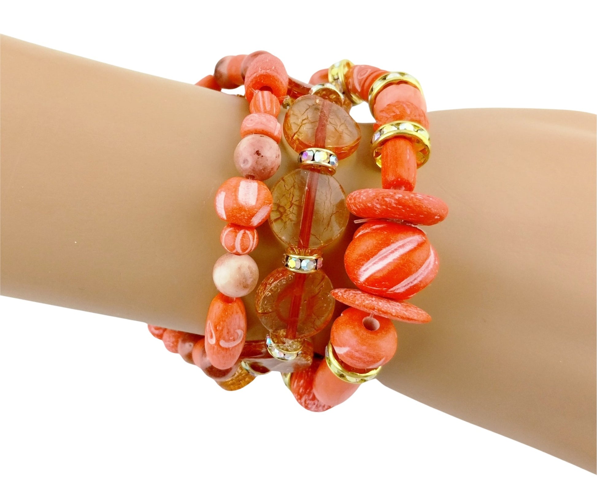 Multicolored beaded bracelet on a wrist against a white background