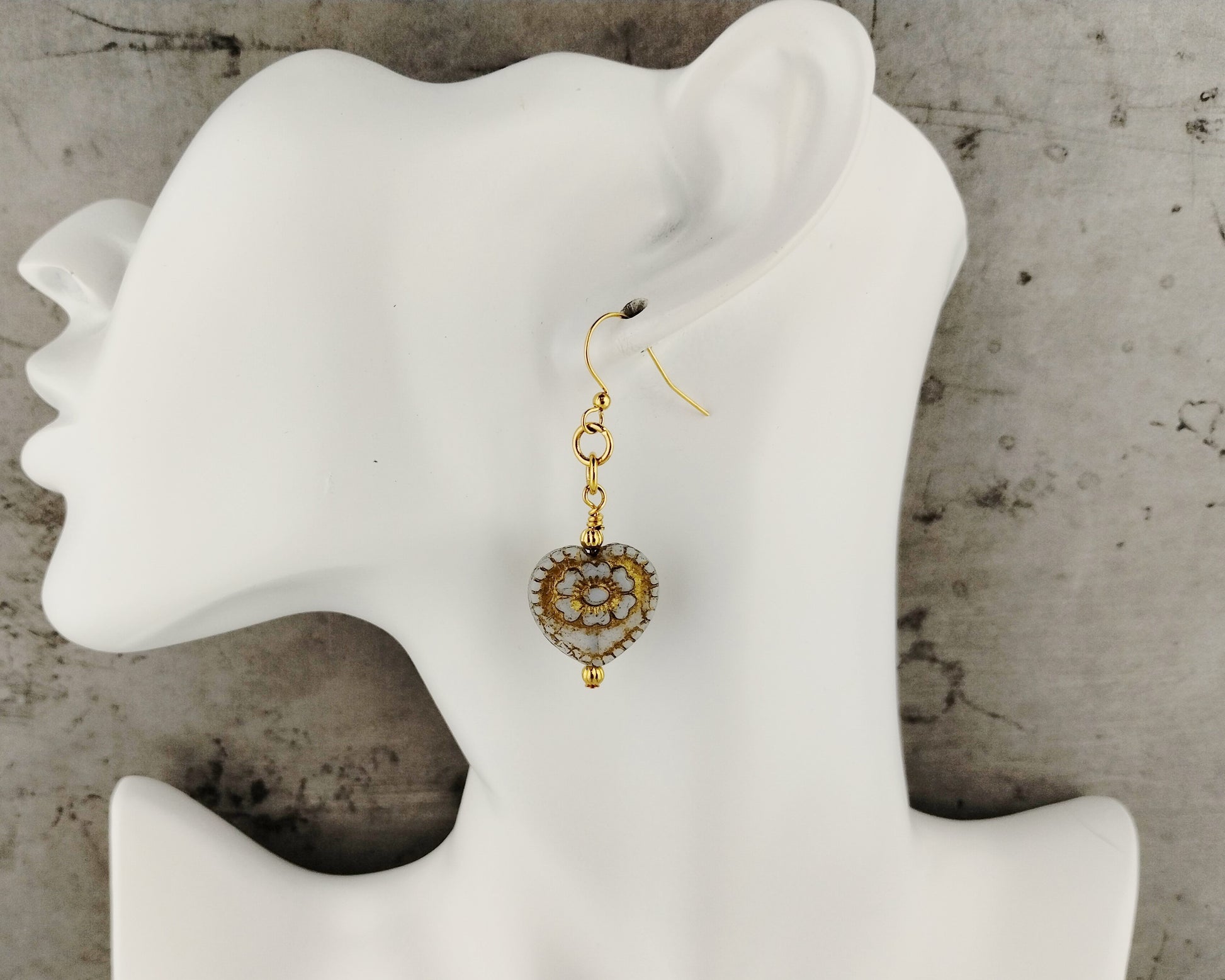 Elegant white heart dangle earrings with gold-plated accents