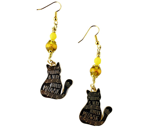 Black enamel kitty earrings with musical quote and yellow bead accents