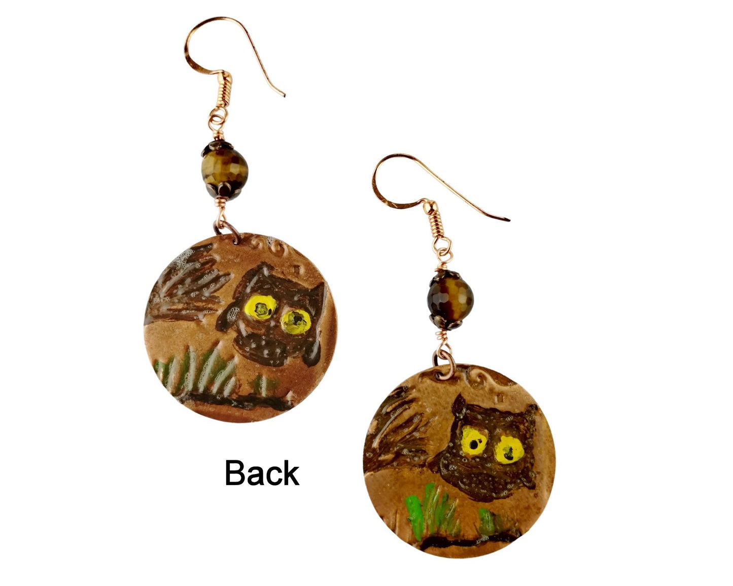 Nature-inspired copper owl earrings with yellow and green detail