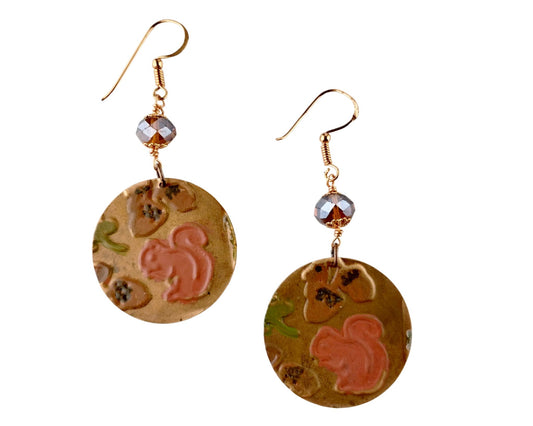 Handcrafted copper squirrel earrings with topaz brown glass beads