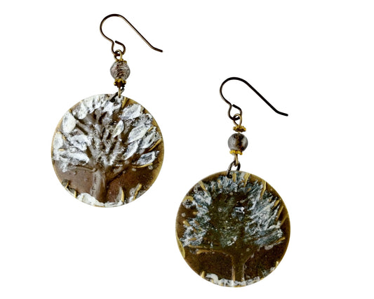 Hand-painted winter tree earrings with snowfall design on brass