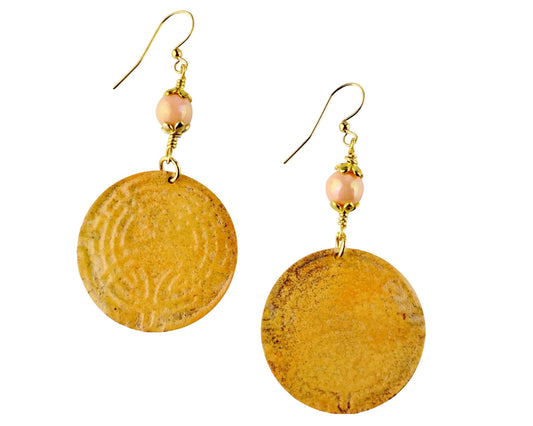 Peach Aztec-inspired round brass earrings with gold-plated accents