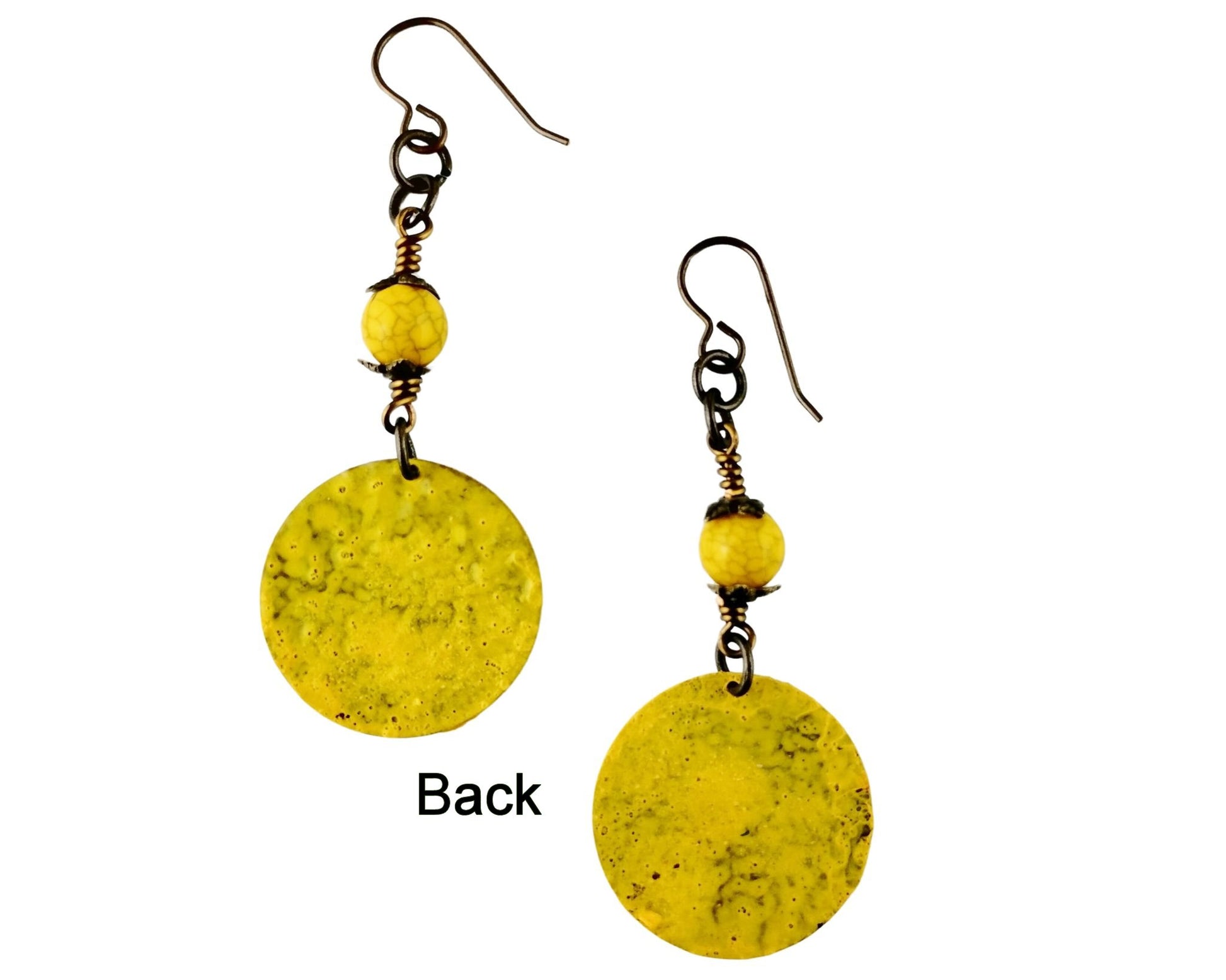 Elegant golden yellow dangle earrings with hand-painted brass and glass details.