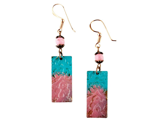 Hand-painted copper earrings with India design and pink bead accents