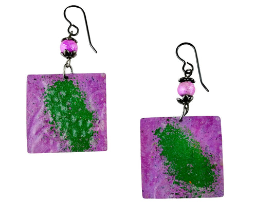 Hand-painted plum purple and fern green iron earrings with botanical design

