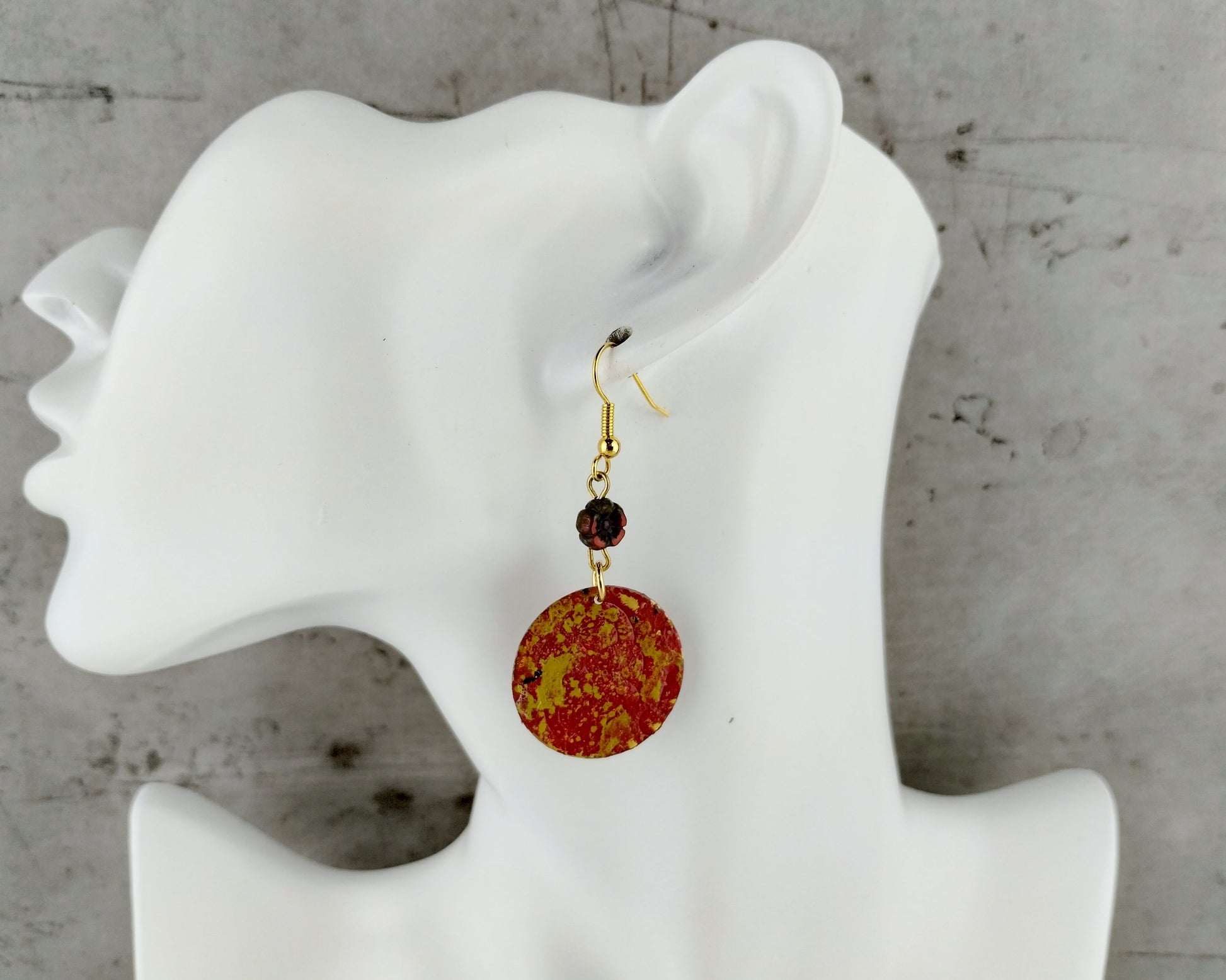 Autumn-inspired round earrings with glass flower beads and brass blanks