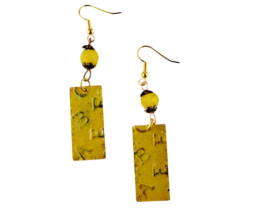 Handmade golden yellow brass earrings with random embossed letters and lemon glass beads