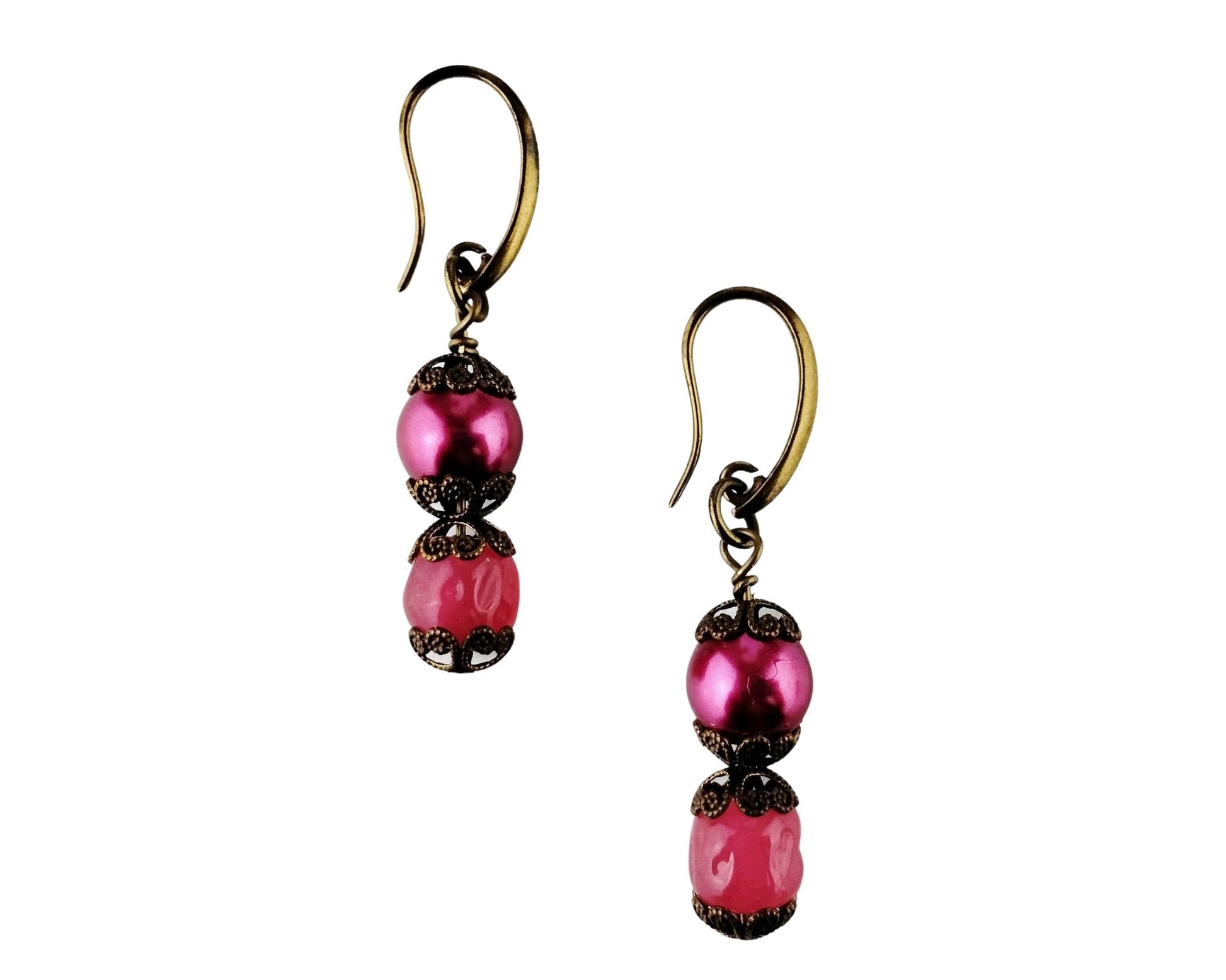 Playful and elegant earrings featuring magenta beads and cherry-shaped glass dangles.