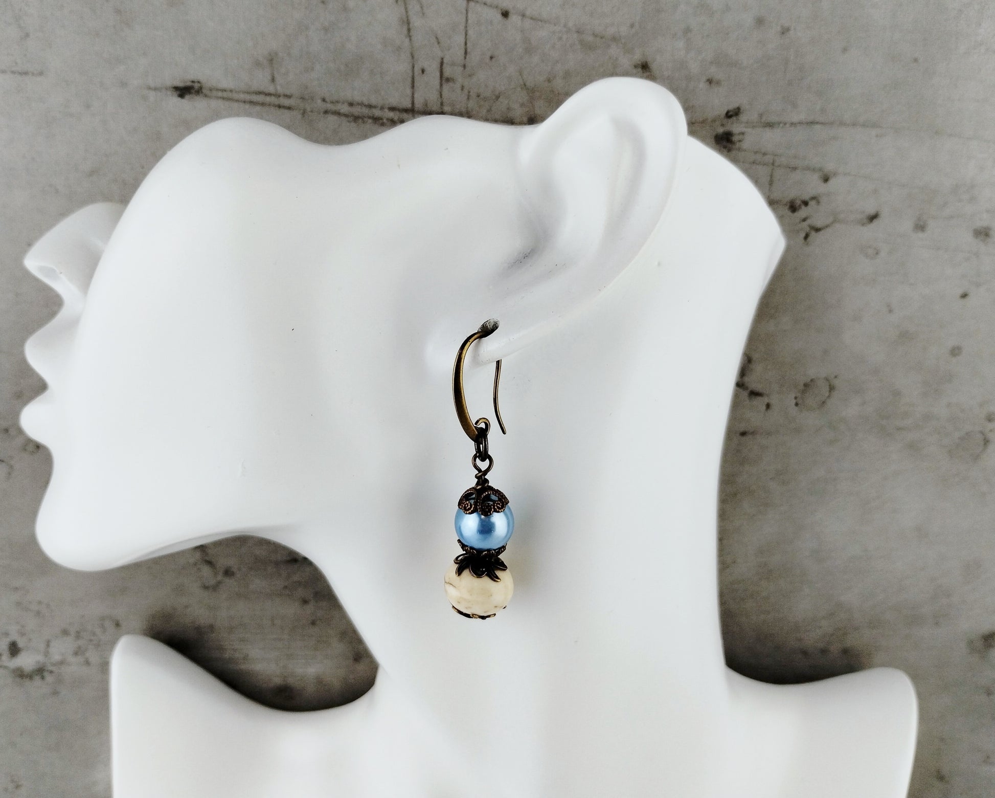 Lightweight blue and white beaded earrings with vintage brass findings.