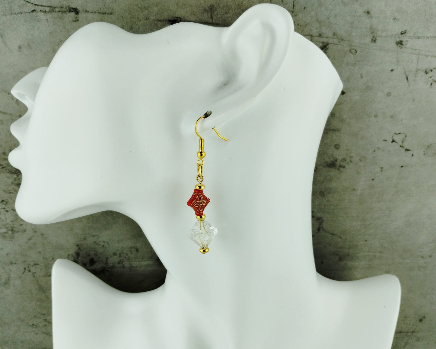Red acrylic and clear staircase bead earrings with gold detailing