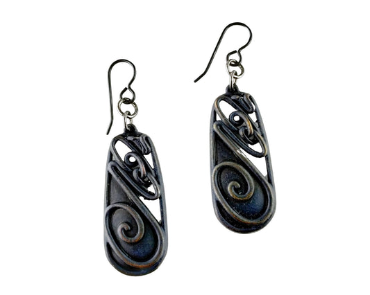 Handmade matte black pewter earrings with swirl pattern