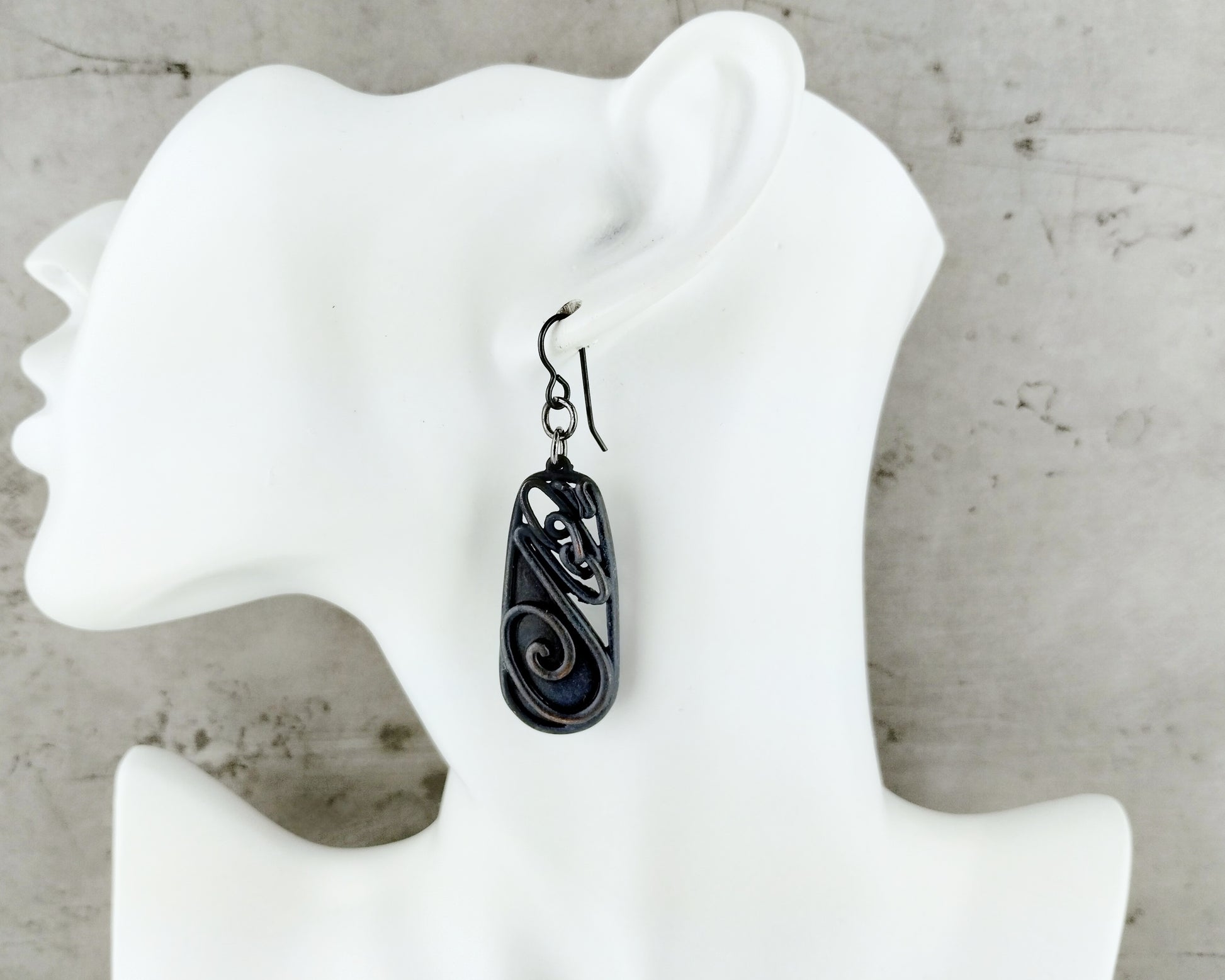 Abstract rectangular earrings with black finish and artistic design