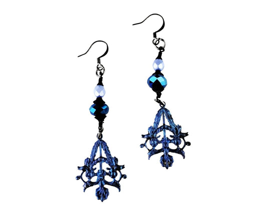 Blue and black chandelier earrings on a white background