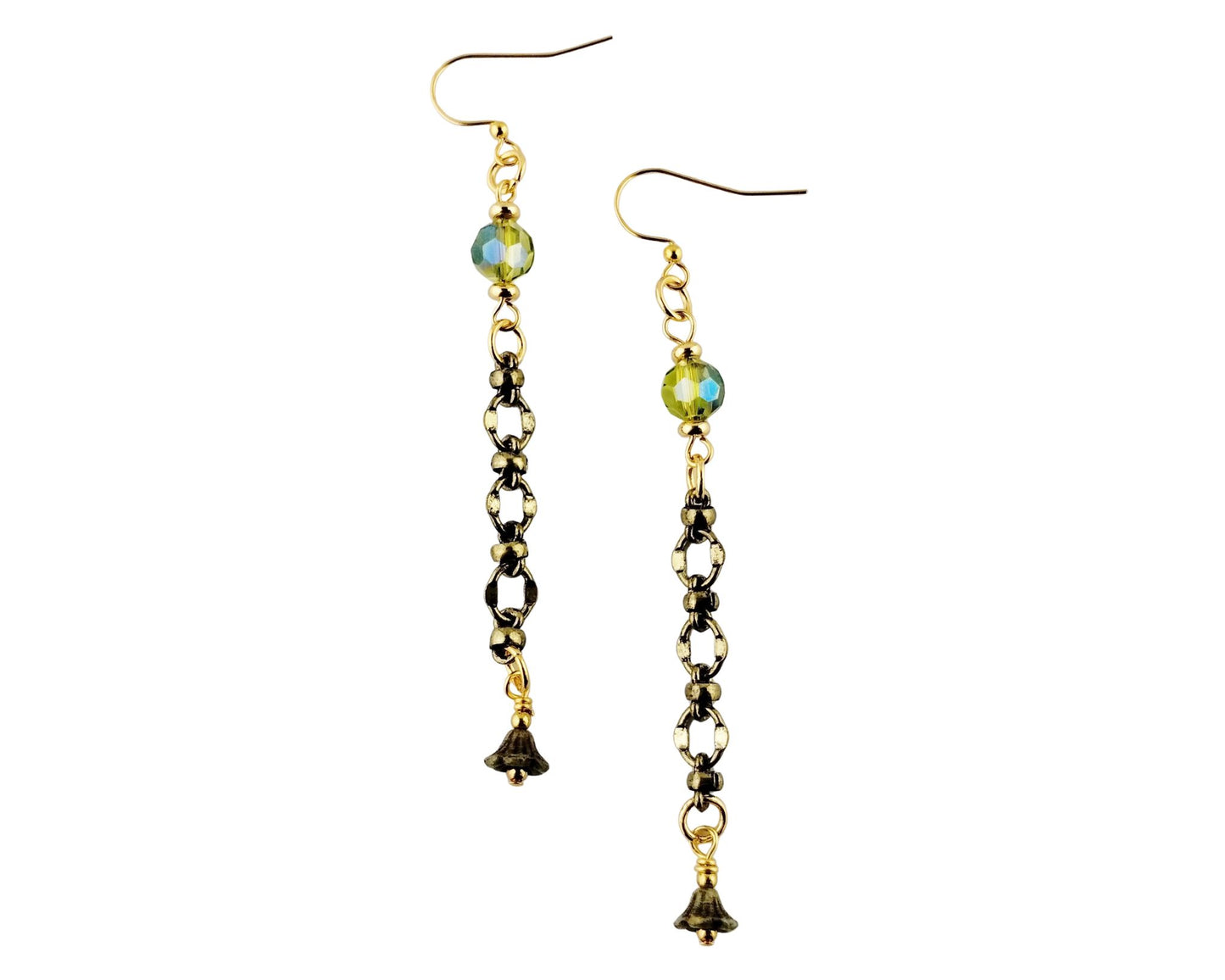 Pair of earrings with beads and small charms on a white background