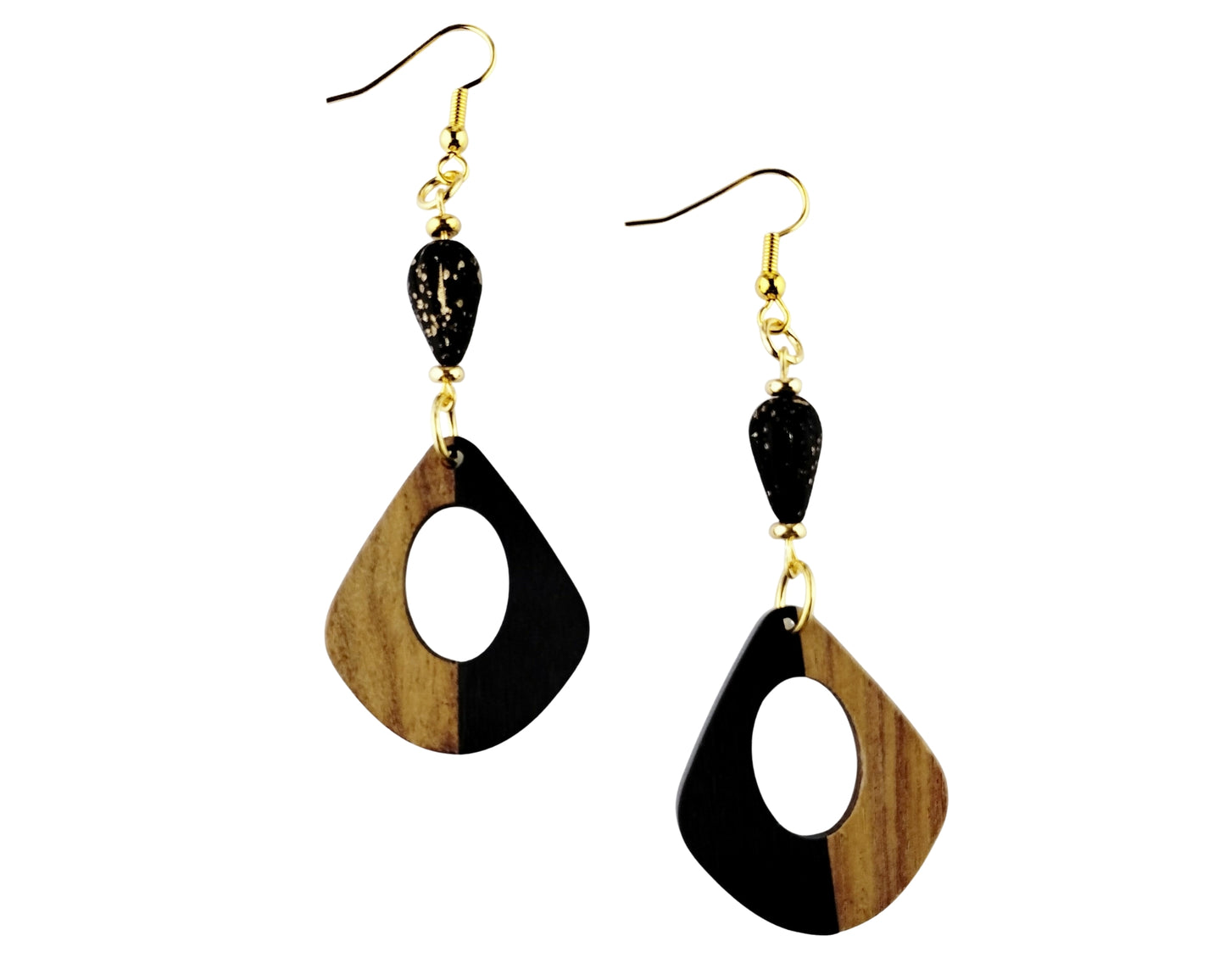Pair of wooden teardrop earrings with black accents on a white background