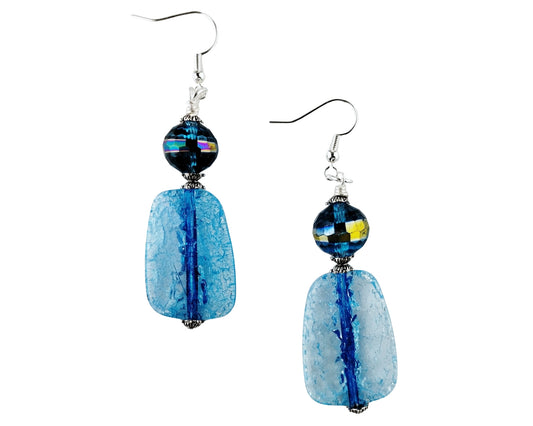 Pair of blue beaded earrings on a white background