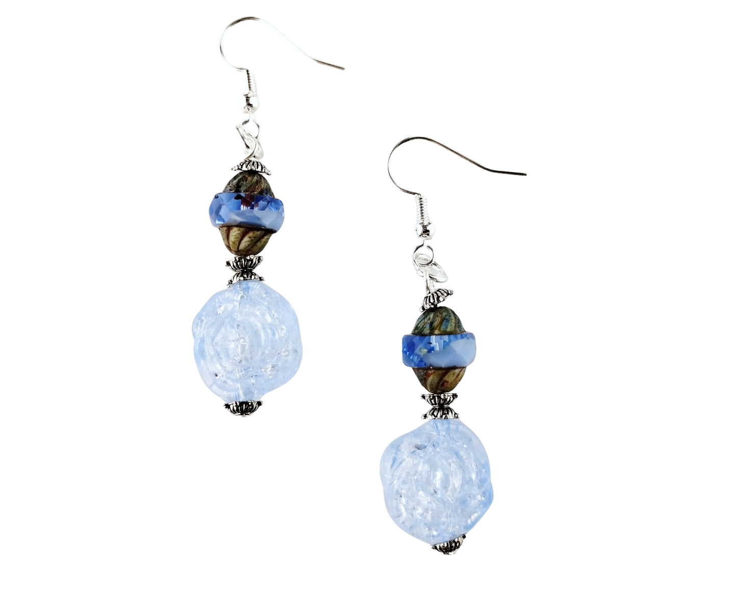 Pair of earrings with blue  beads on a white background