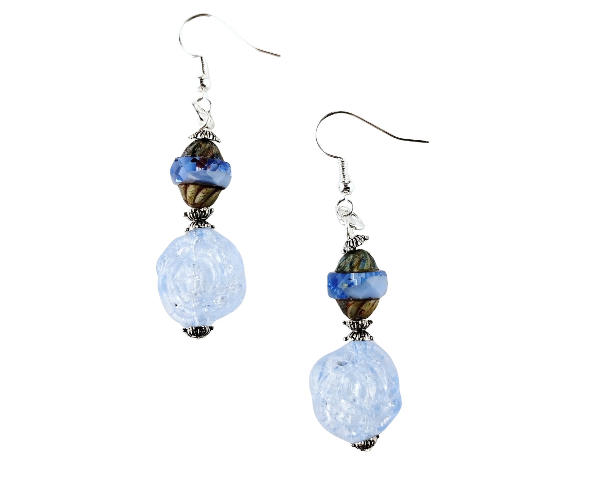 Pair of earrings with blue  beads on a white background