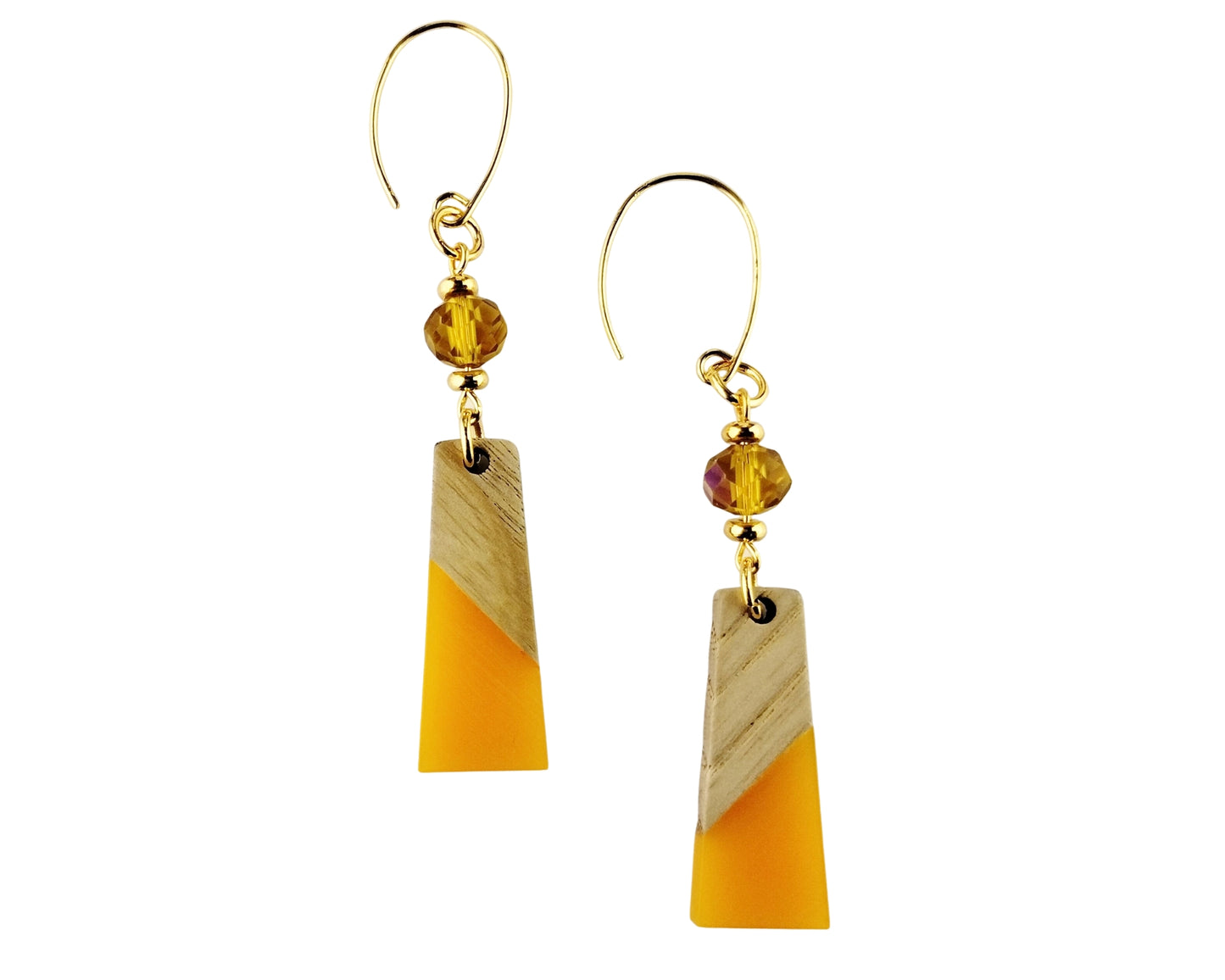 Pair of earrings with gold and yellow beads on a white background