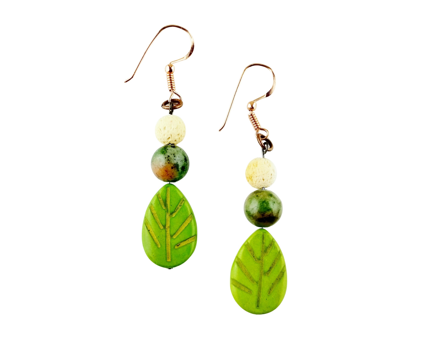 Pair of green leaf-shaped earrings with beads on a white background