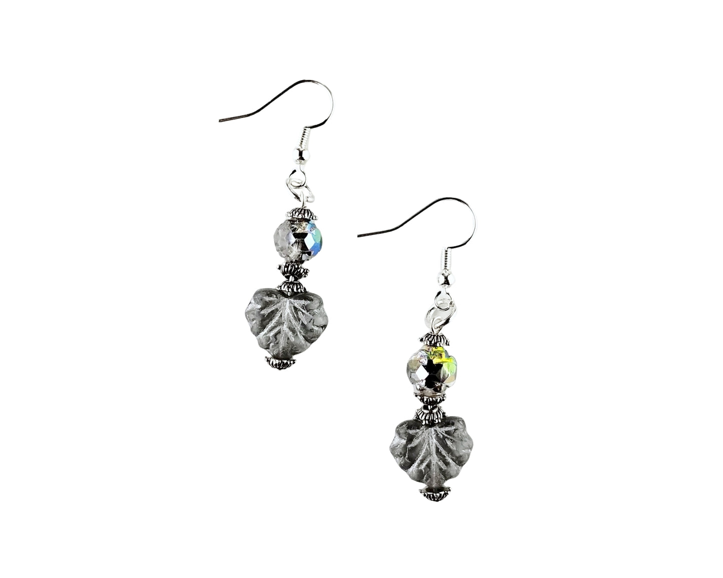 Pair of earrings with gray and clear beads on a white background