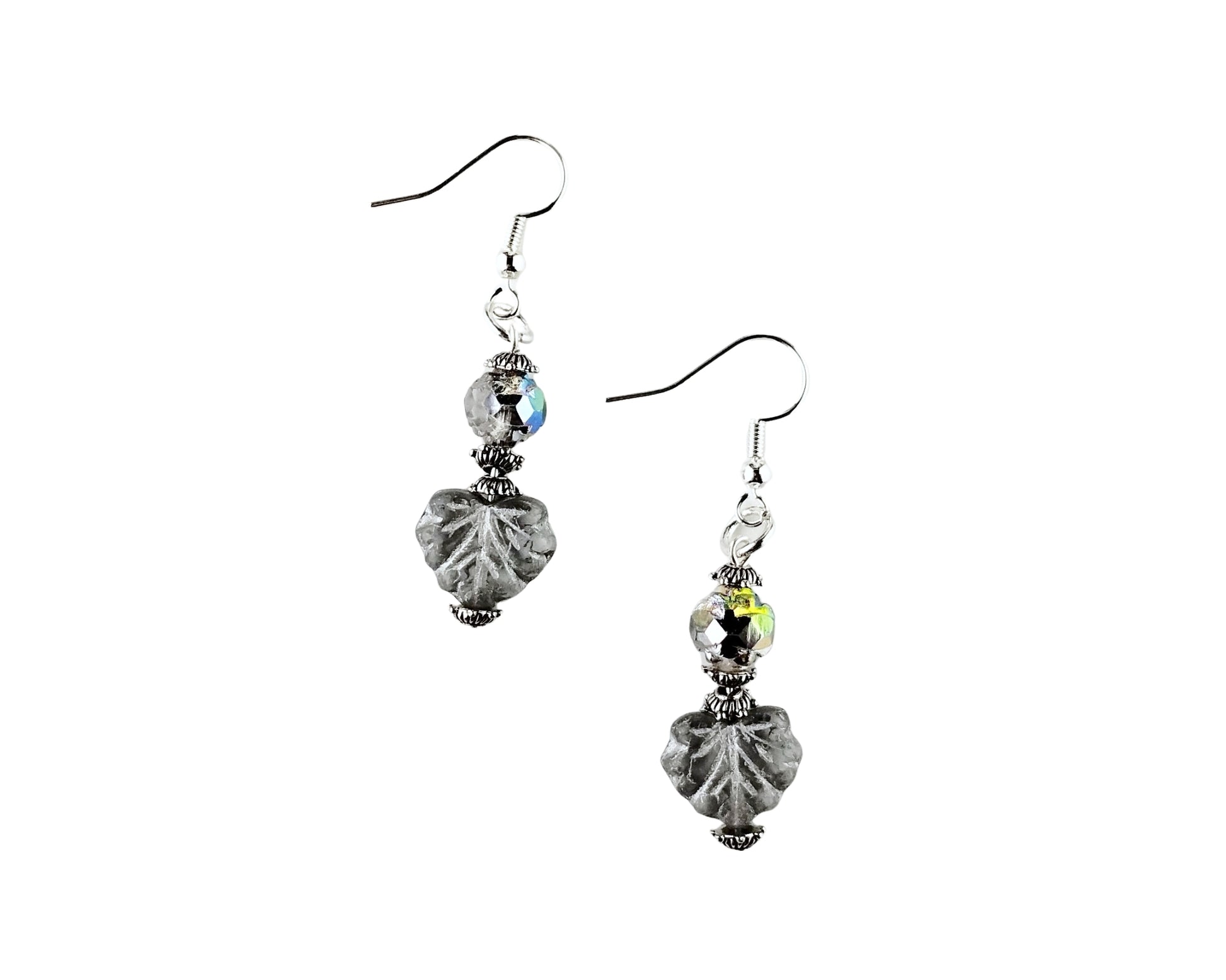 Pair of earrings with gray and clear beads on a white background