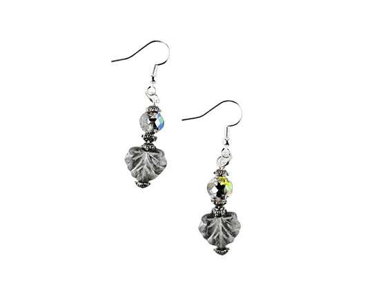 Pair of earrings with gray and clear beads on a white background