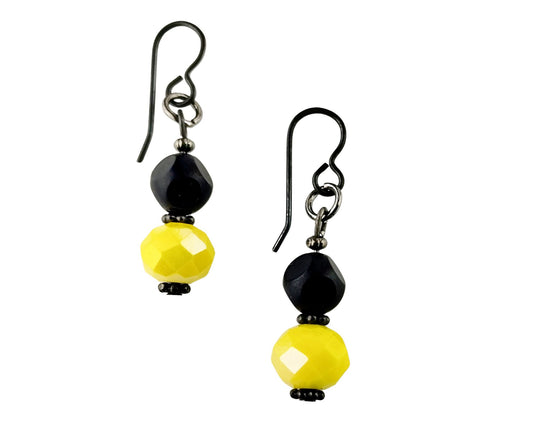 Handmade lemon yellow and black glass bead earrings with matte finish