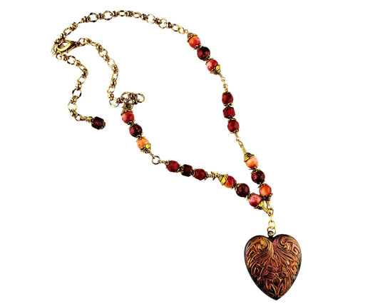 Handmade gunmetal heart pendant necklace with red and gold finish