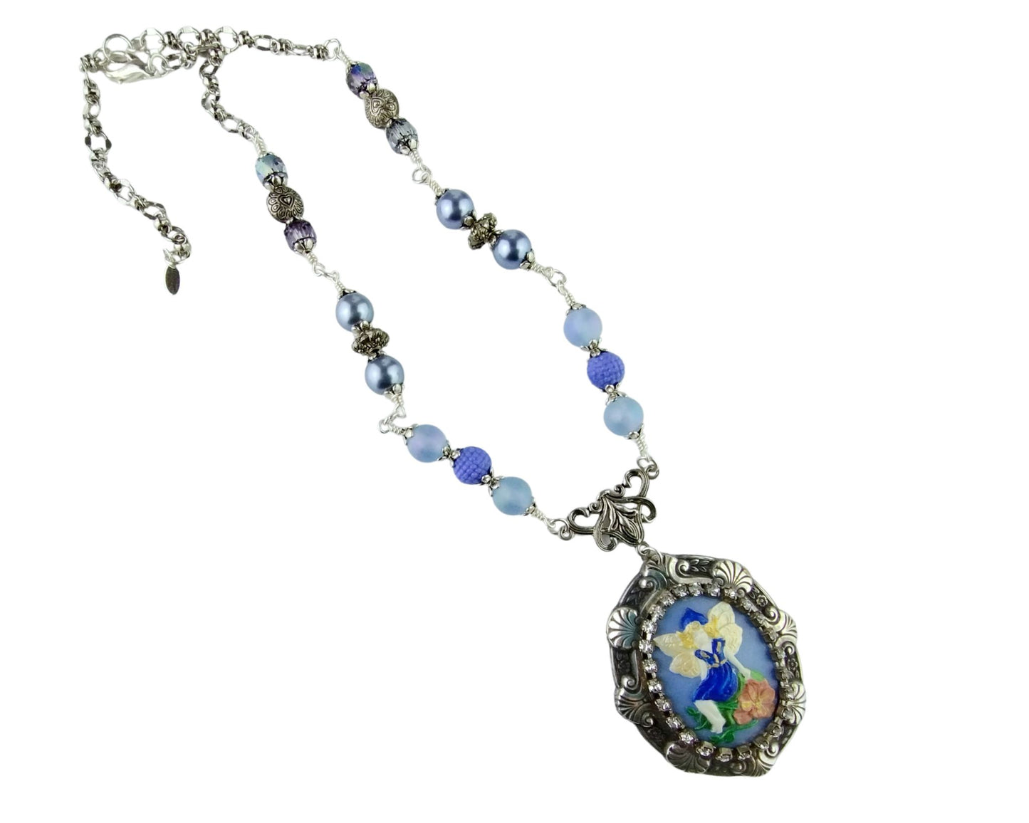 Fairy-themed necklace with light blue pearls and sparkling rhinestone details.