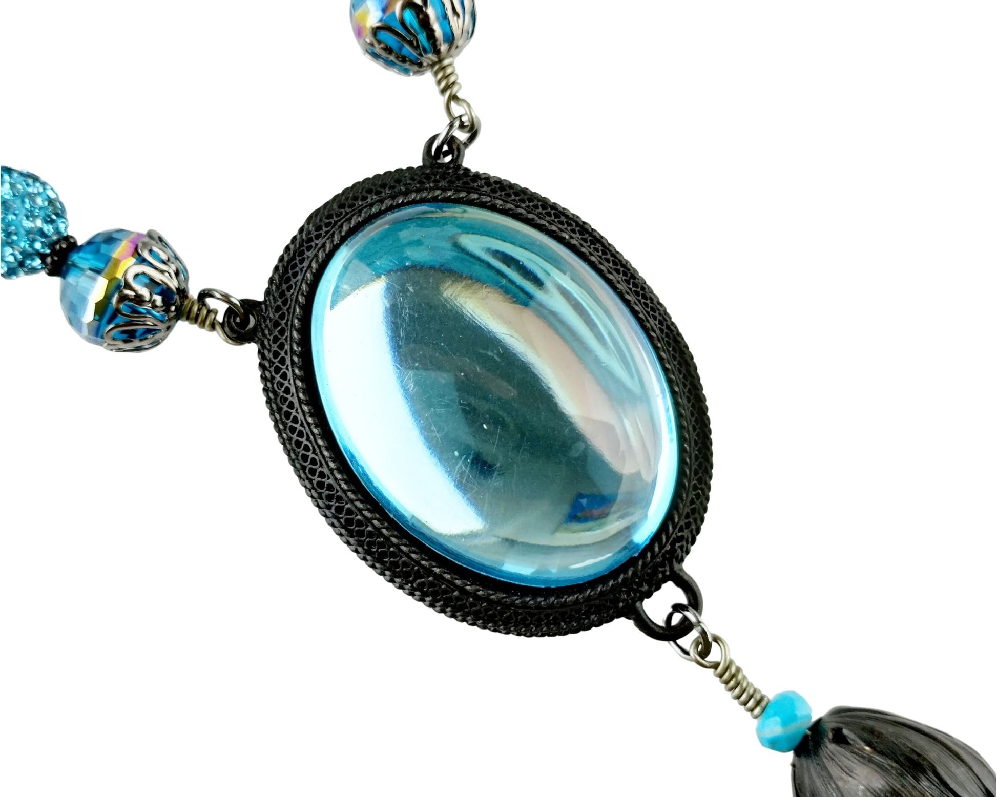 Handmade necklace with mirrored aqua cabochon and gunmetal tassel