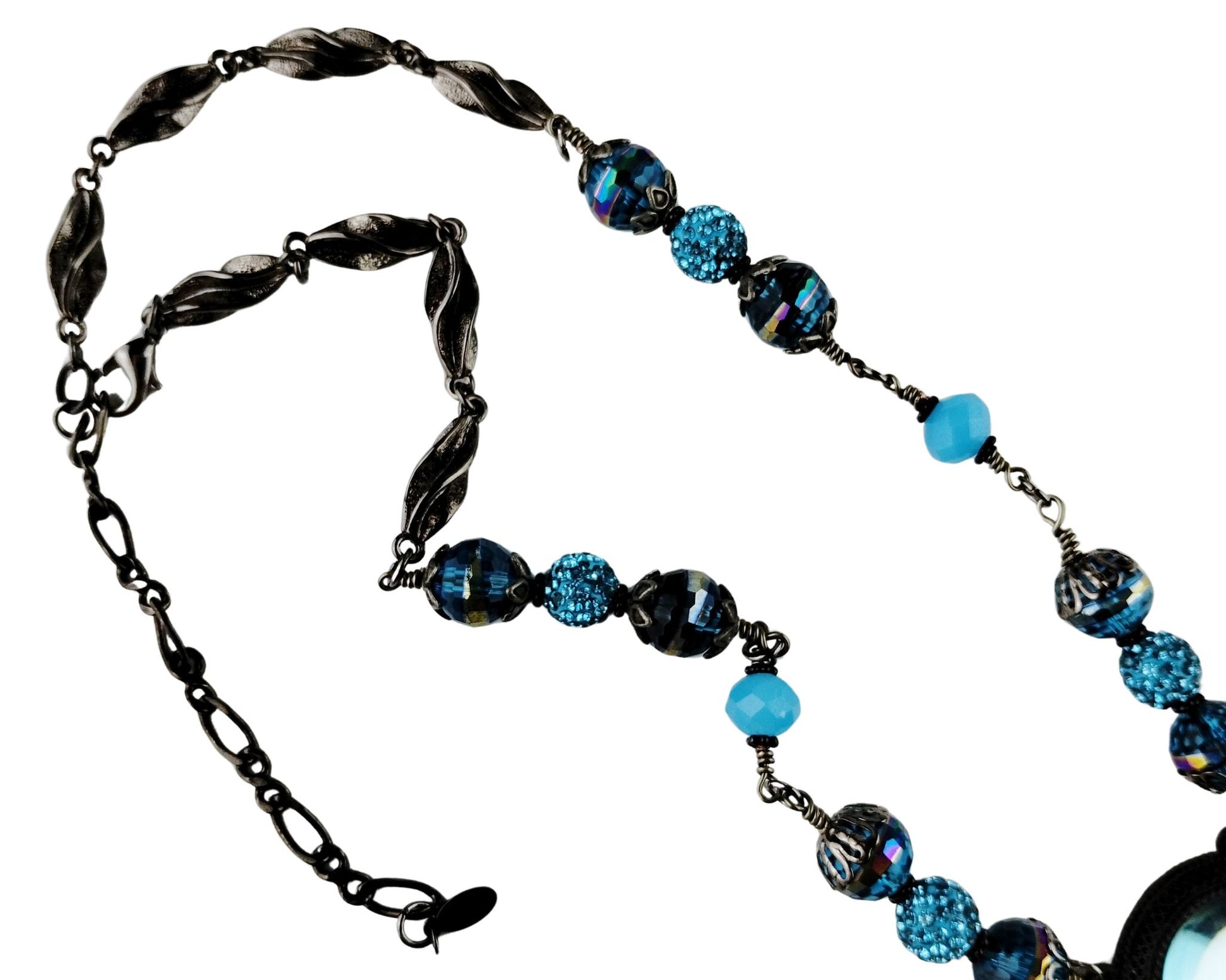 Aqua and gunmetal handmade necklace with floral bead cap and chain tassel