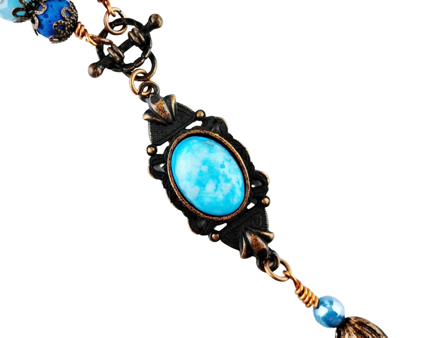 Adjustable handmade necklace with aqua beads and antique copper connectors