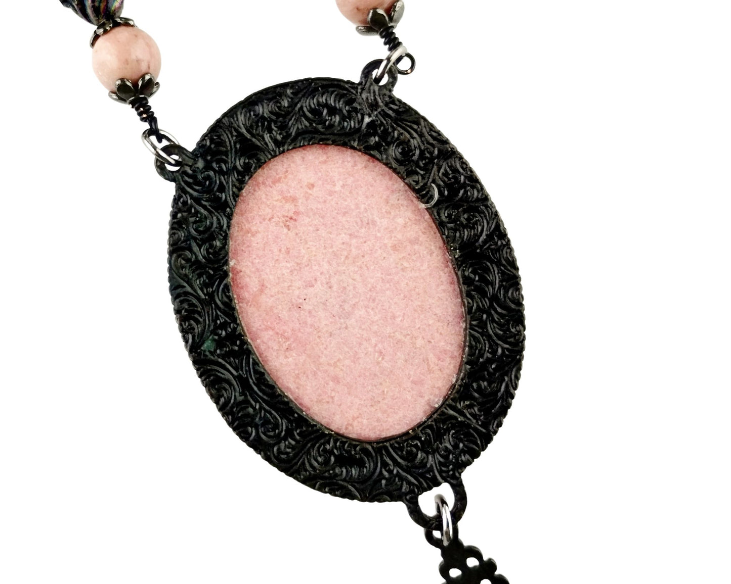Back of bold pink and black stone necklace