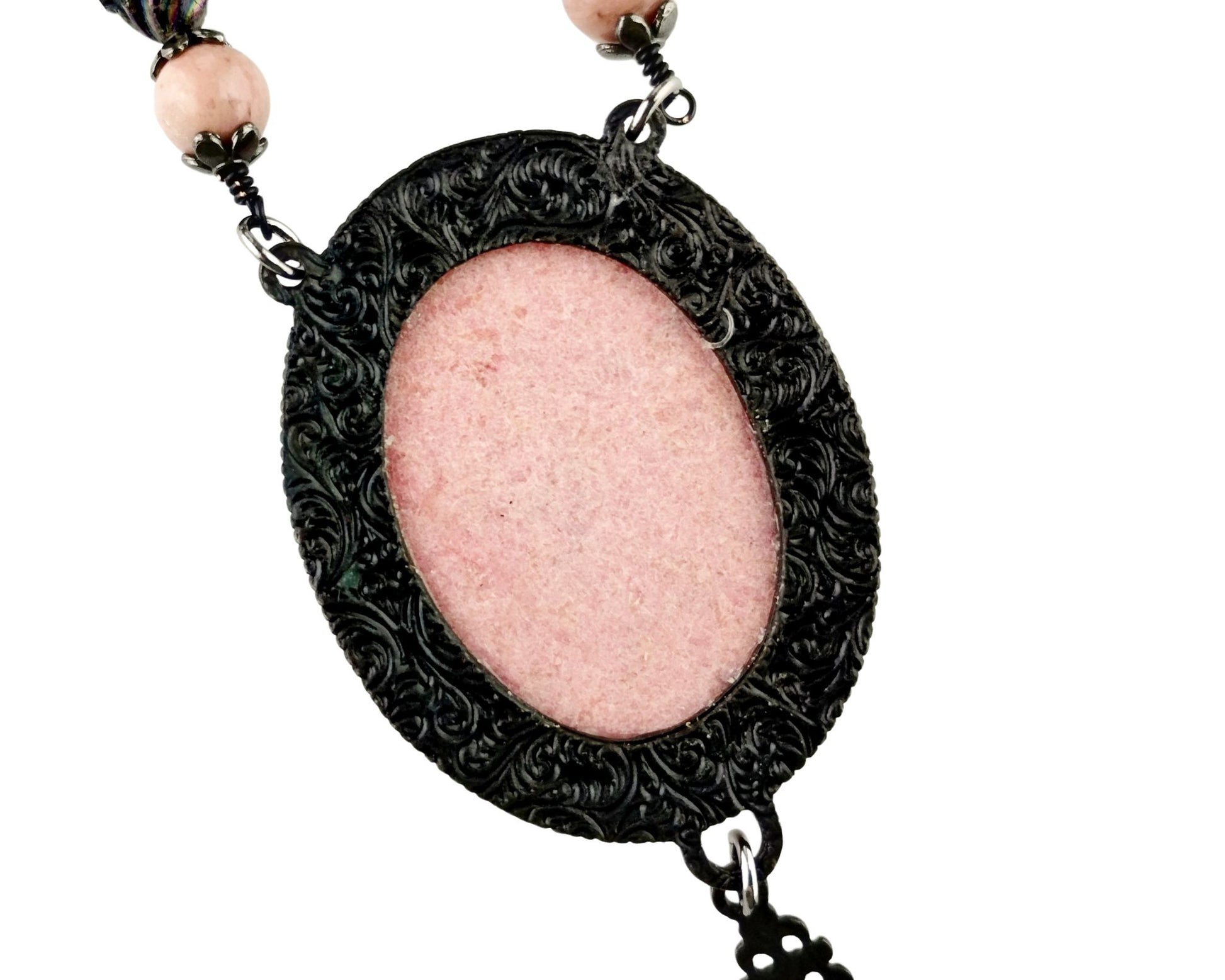 Back of bold pink and black stone necklace