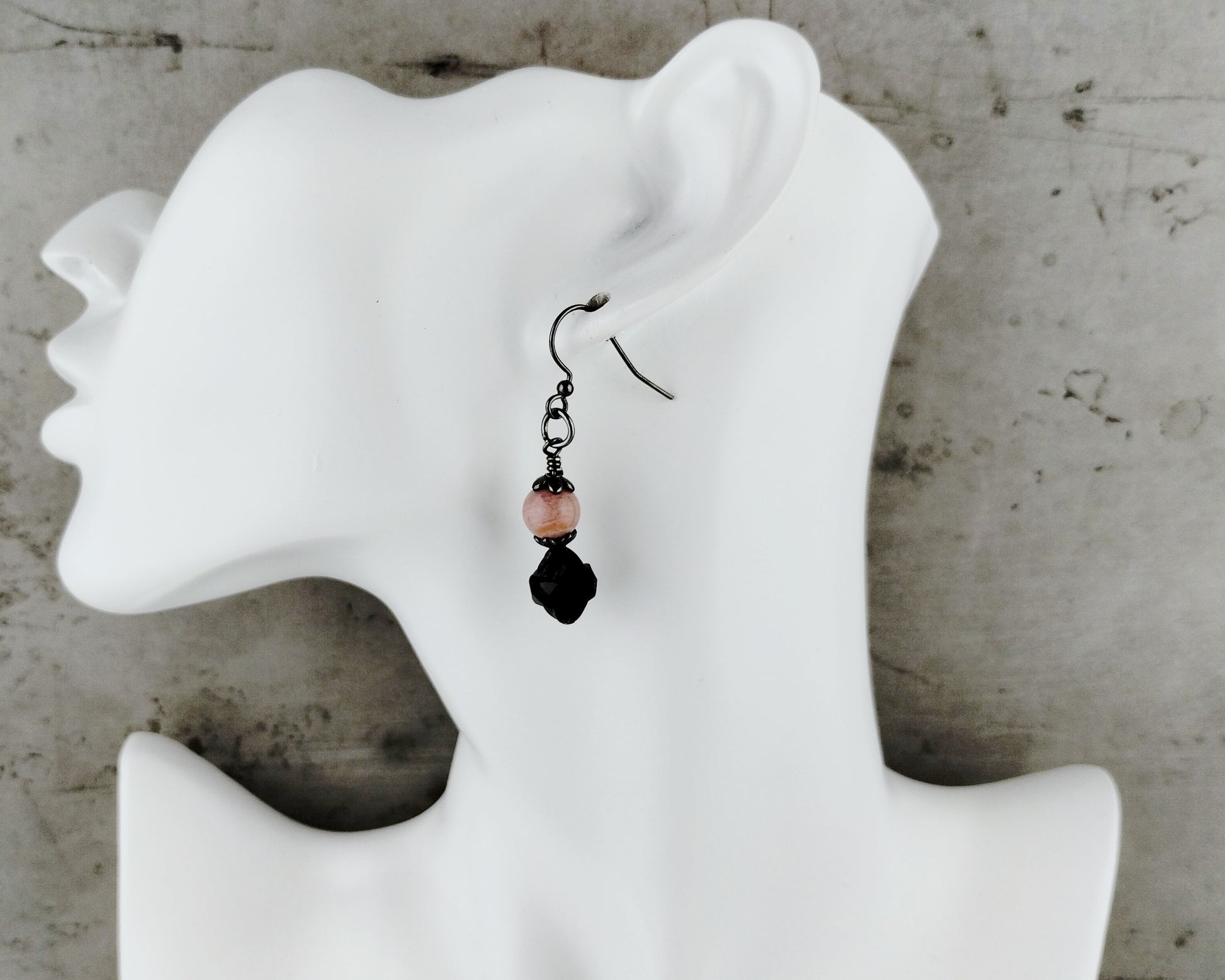 Matching pink stone earrings with black glass and gunmetal accents