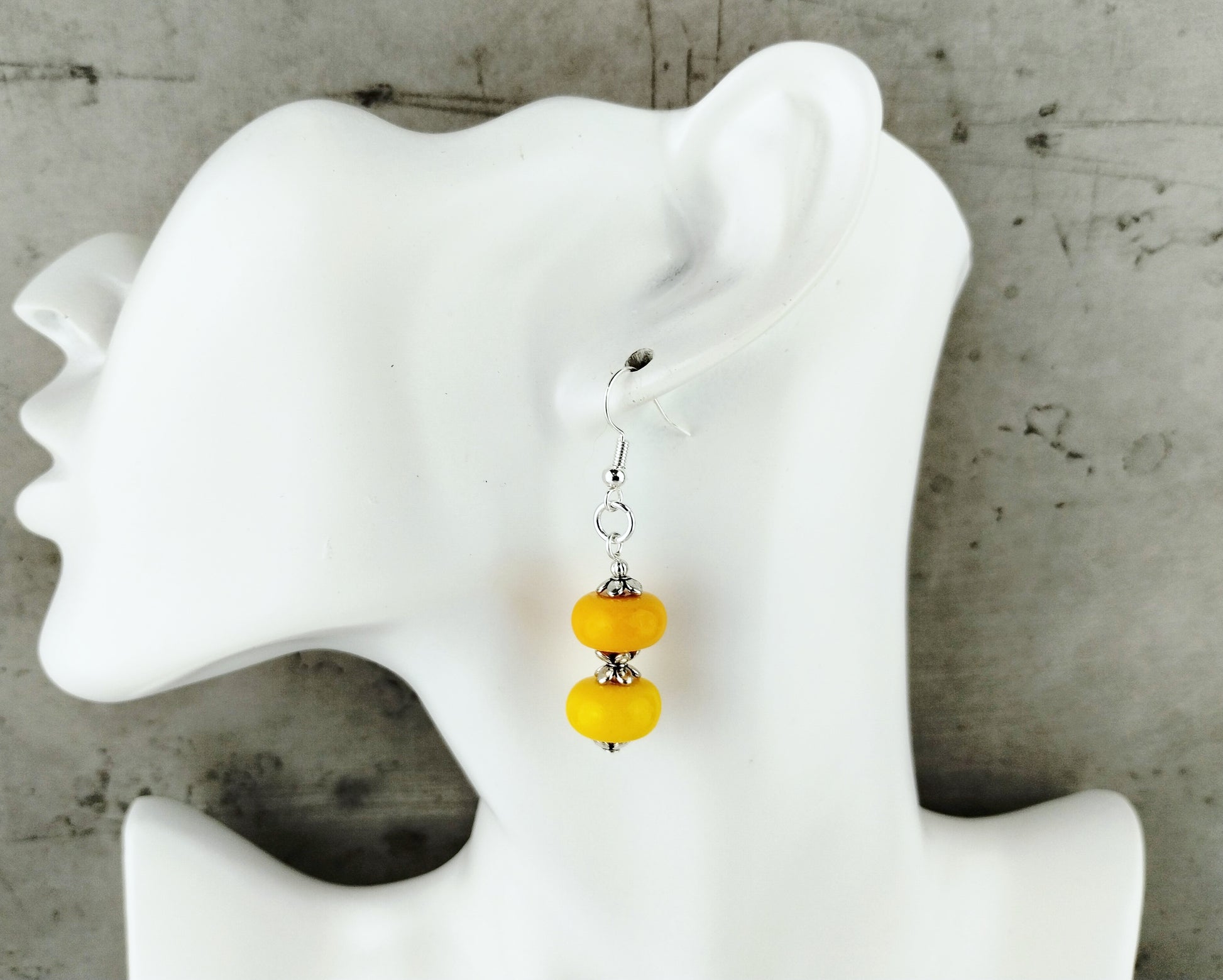 Earrings on mannequin 