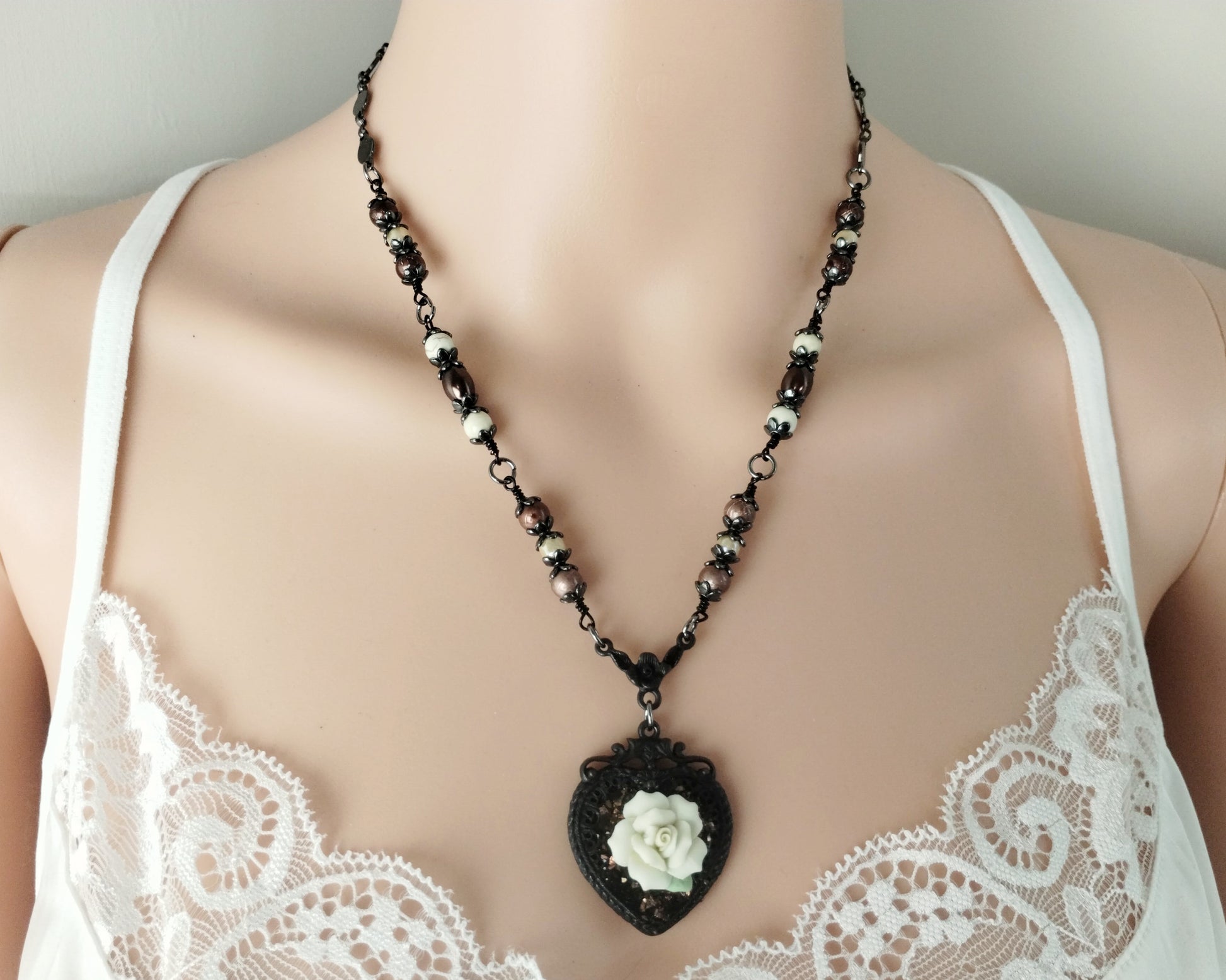 Matte black and cream rose necklace