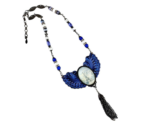 Handmade Paris necklace with Eiffel Tower cabochon and blue beads