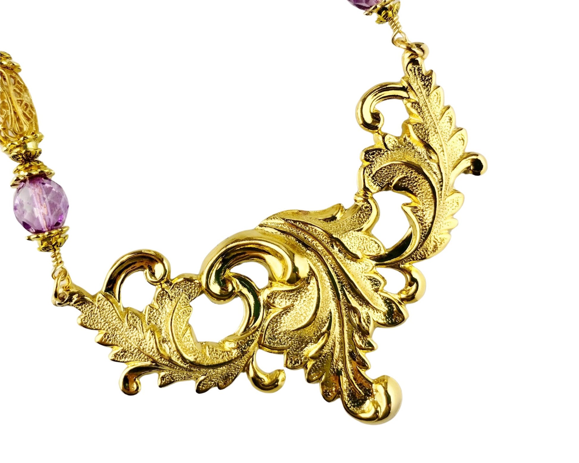 Statement necklace with nature-inspired leaf design and rich colors