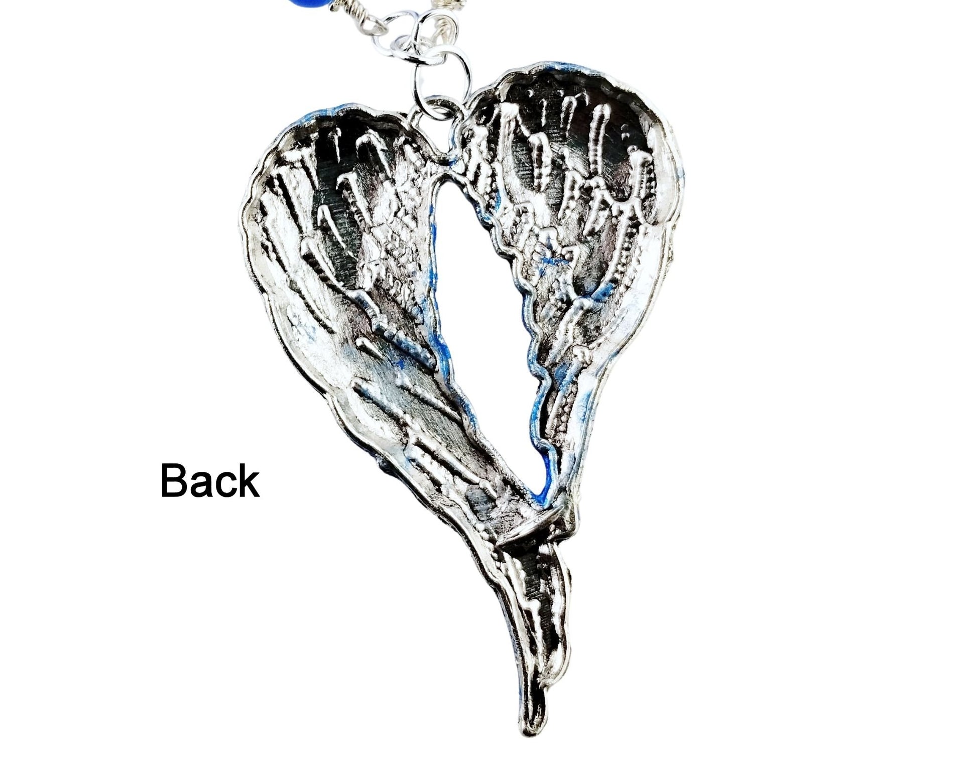 Back of Silver and blue angel wing necklace set