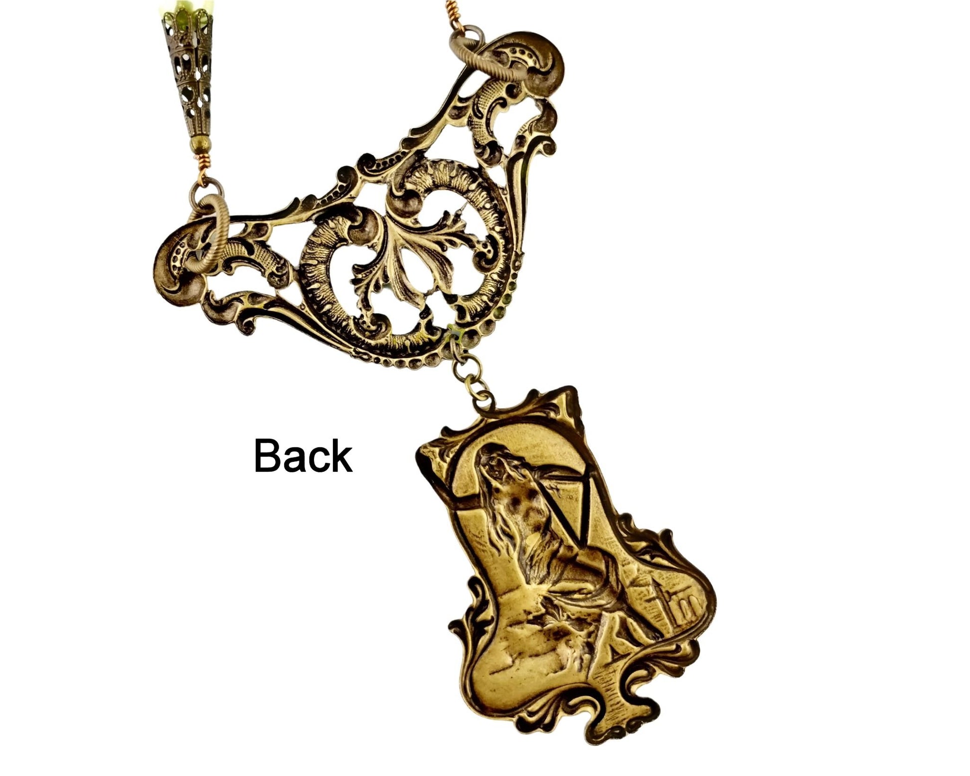 Back of Mythology-inspired jewelry set with brass ox pendant and vintage chain