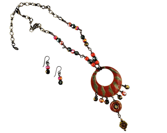 Jewelry set with necklace and earrings on a white background