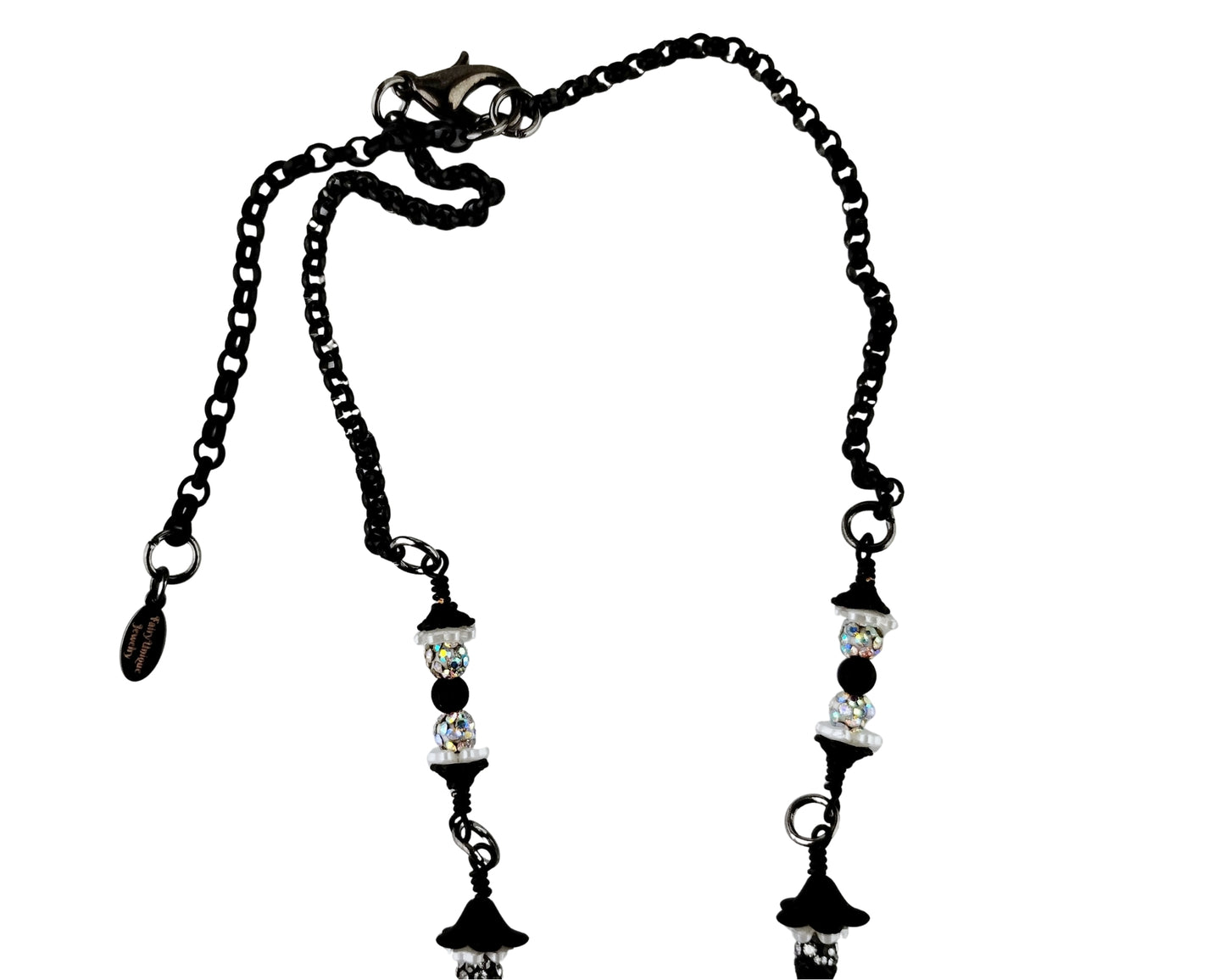 Black chain necklace with decorative beads on a white background